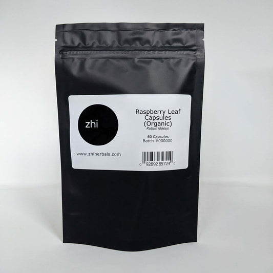Zhi Herbals Raspberry Leaf Capsules (Organic) in a black resealable bag with product label and barcode.