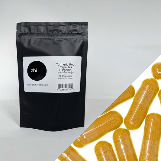 Zhi Herbals Organic Turmeric Root Capsules, black package with label, next to a close-up of the orange capsules.